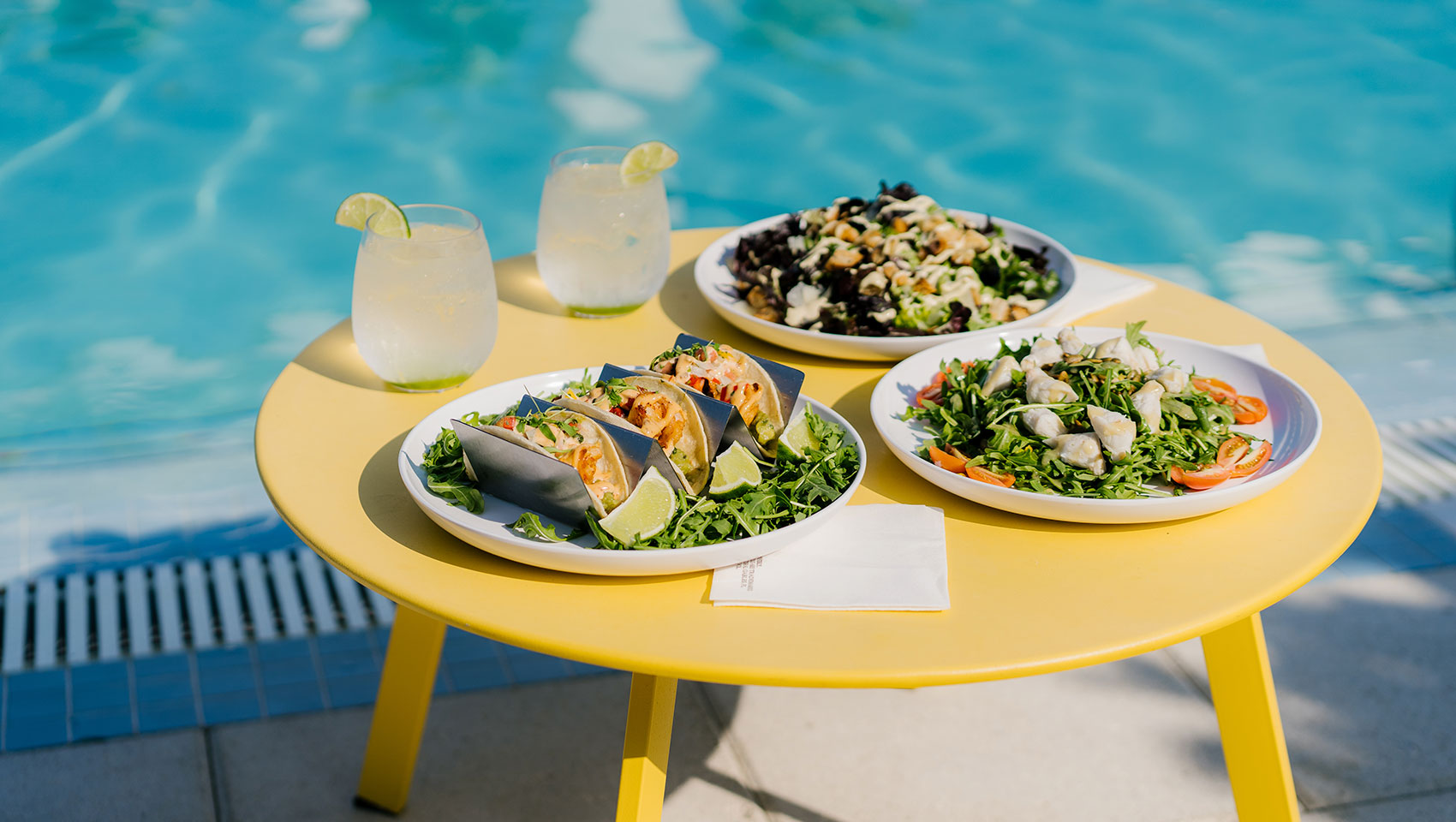 cocktails and salads by the pool