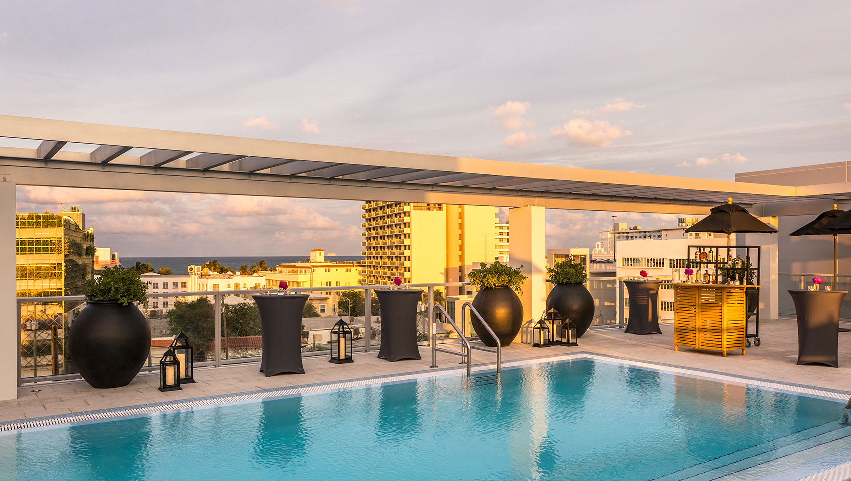 rooftop pool with cocktail reception set up