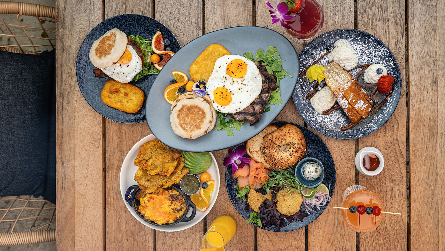 a group of plates of food on a table