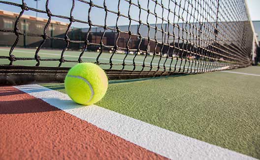 Tennis ball on court